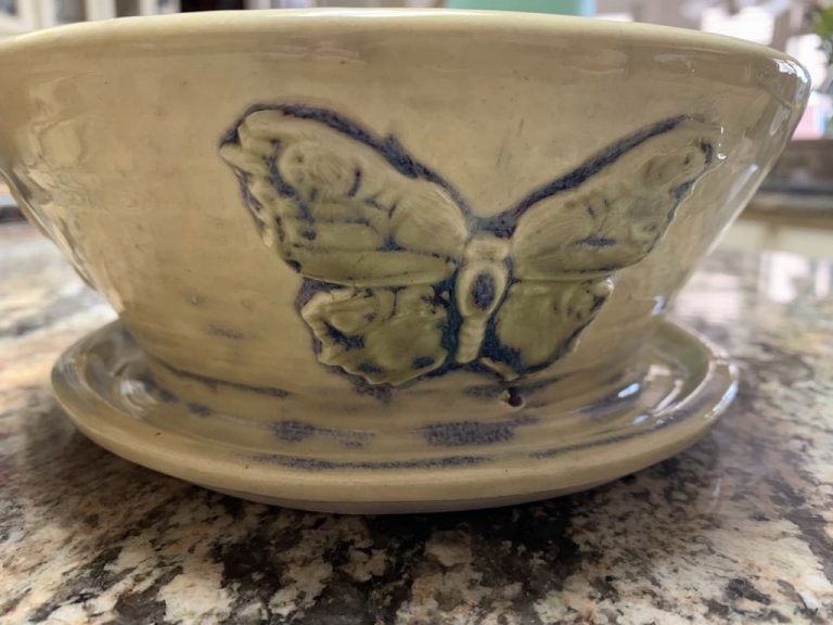 cream butterfly planter from Clay By Kim Pottery in Fort Walton Beach